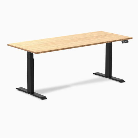 Top Tier Dual Motor Electric Height Adjustable Standing Desk With A Roomy 80 Inch Wide Bamboo Top And Sleek Matte Black Frame, side view