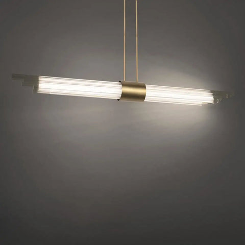 Super Sleek Linear Led Pendant Light Featuring Contemporary Ceiling Fixtures With Tight Profiles And Warm Aged Brass Finishes That Truly Hits Different On Kitchen Islands Or Main Dining Tables, showcasing brass housing and sleek design.