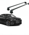 BMW Roof Rack Cross Bars For iX 2020 And Up No Drilling Aluminum T Slot Design Lockable beside a black BMW SUV