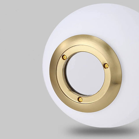 Close-up of brass accent on Dope 2 Light Globe Pendant Lighting With White Glass Shades And Brass Gold Metal Accents Modern Hanging Ceiling Chandelier