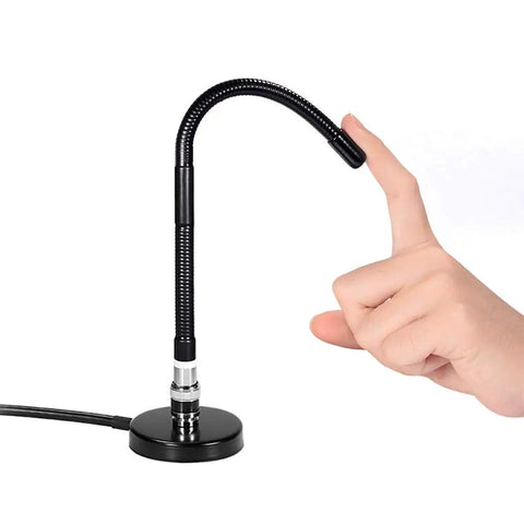 27MHz CB Radio Antenna Soft Whip With Magnetic Base For Handheld And Mobile Use shown being flexed by a hand