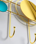 Built Different Wall Mounted Coat Hooks For Entryway with gold circular design and teal accent, sturdy wall mount for hats and keys.