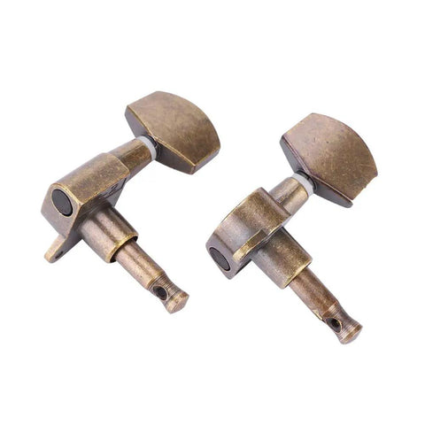Close-up of brass-colored tuning pegs from Six Guitar Locking Tuners With Screws Copper Alloy Machine Heads for guitars.