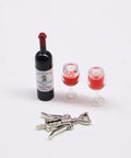 Hella Cool Miniature Red Wine Bottle Set featuring two resin filled wine glasses and a static corkscrew for dollhouse decor.