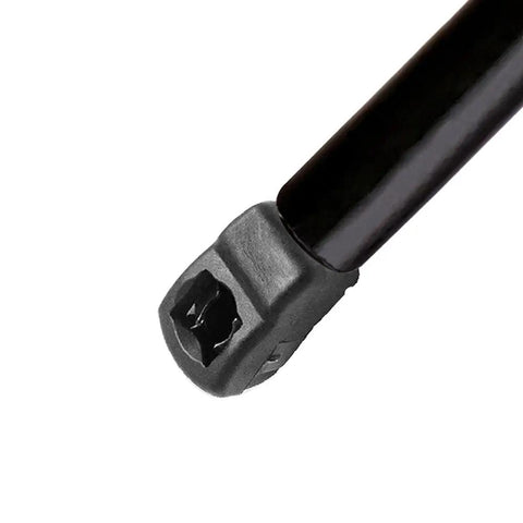 Close-up of Tough As Nails Hatch Lift Supports Replacement for Volkswagen GTI, showcasing the black coated steel end fitting.