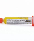 Yellow UV Soldering Paste Flux 10cc syringe for PCB BGA circuit boards with a push needle, ideal for rework and repairs.