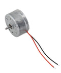 High Output Dc Motor Running 1.5 To 6V Kicking Out A Clean 9000 Rpm inside a sleek 24mm round metal casing with wires.