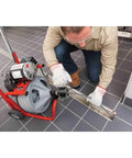 Heavy Duty 115 Volt Electric Conduit Bender Machine Featuring Autofeed And C45 Integral Wound Cable Designed To Bend Rigid Pipe Like Butter in use by a contractor.