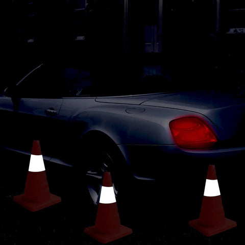 Convertible car parked near collapsible 18 inch orange traffic cones set of 5 with reflective strips, pop up construction cones.