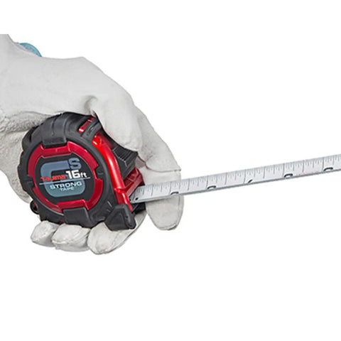 Gloved hand holding Pro Grade Tape Measure 16 Ft By 1 In GS Lock Standard Scale With Shock Resistant Case And Acrylic Coated Steel Blade
