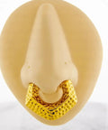 Gold V-shaped hinged clicker ring on mannequin, resembling Dope Hammered V Shaped Hinged Clicker Ring For Stretched Piercings.