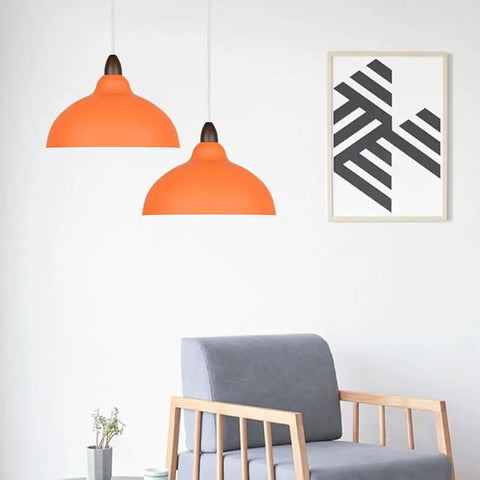 Minimalist Colorful Pendant Light Fixture, Simple Rustic Dome Lamp, Japanese Style Lighting over gray chair in modern setting.