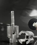 Badass Integrated Thread Cutting Tool For Half Inch And Three Quarter Inch Pipes with metal die blocks and handle mechanism.