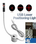 Plug And Play USB Laser Alignment Light With Slick Magnetic Mount For Sewing And Craft Cutting Delivering Crisp Red Cross Lines in use.