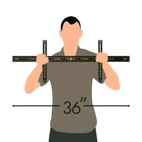 Person holding 36-inch Picture Hanging Tool Kit with Built-In Level and Ruler, showing tool size and use.