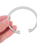 Hand holding 5 Piece Stainless Steel Internal C Clip Snap Ring Set For Shafts And Pins, Built To Last 304 Stainless Steel Assortment Kit.