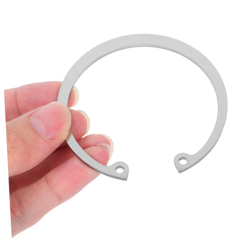 Hand holding 5 Piece Stainless Steel Internal C Clip Snap Ring Set For Shafts And Pins, Built To Last 304 Stainless Steel Assortment Kit.