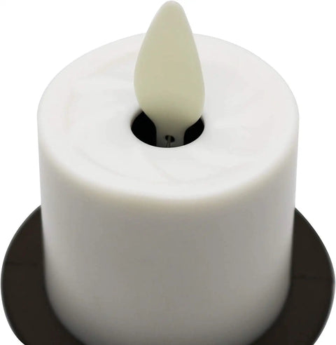 Close-up of Bronze Plug In Flameless Night Light With Real Flame Effect Dusk To Dawn Sensor Indoor Wall LED Candle, top view.