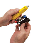 Hands holding Explorer 2 Coax Test Kit with Cable Tester Wire Tracer Coax Mapper and Remotes, showing the test tool and remotes.
