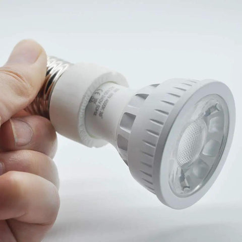 E26 E27 To GU10 Ceramic Socket Adapter Built Tough For Heavy Duty Halogen And Led Spotlight Work UL Certified 660 Watt close-up in hand