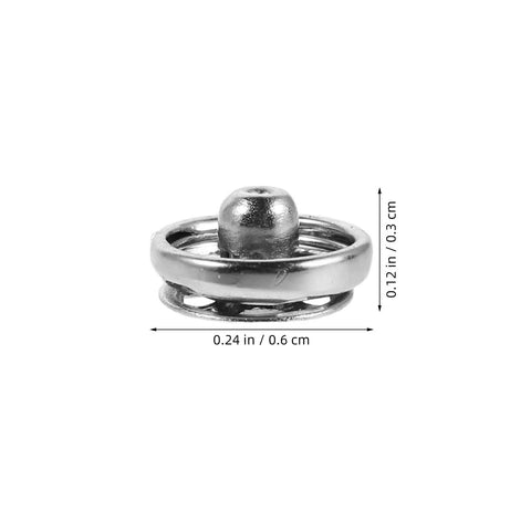 Close-up of a 6mm silver metal snap fastener from the 120 Pcs Silver Metal Snap Fasteners 6mm Mini Sew On Button Closures kit