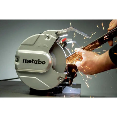 Heavy Duty 8 Inch Bench Grinder With 3600 Rpm And 5.5 Amp Motor in use, sparks flying during metal sharpening.