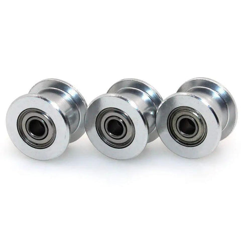 Close-up of four 20 tooth bore 5mm idlers from the 5M GT2 Timing Belt Kit for 3D printers
