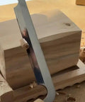 Pro Grade Dual Handle Draw Knife Sporting A Killer Razor Edge And Sweet Grip, used on wood for clean carving.