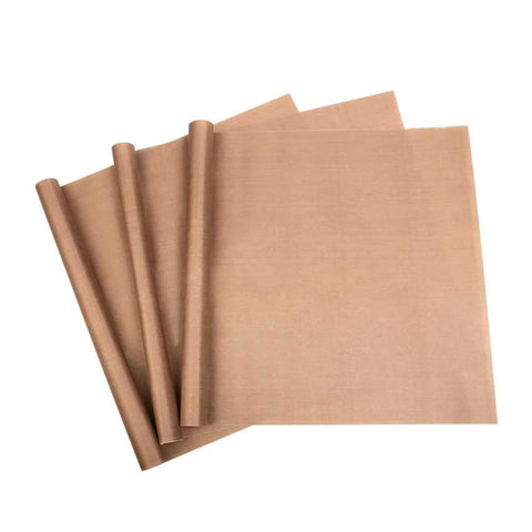 Three Pack 16x24 Inch PTFE Teflon Sheets, 0.11mm Thick, Nonstick Heat Press Sheets for Transfers, arranged on a surface
