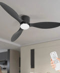 52 Inch Black Flush Mount Ceiling Fan With Remote And Light Kit, Low Profile Modern Look, 3 Blades, 3 Color Dimmable LED Lights, 6 Speeds, Quiet Reversible DC Motor For Bedroom Living Room Indoor Outdoor with remote control in hand