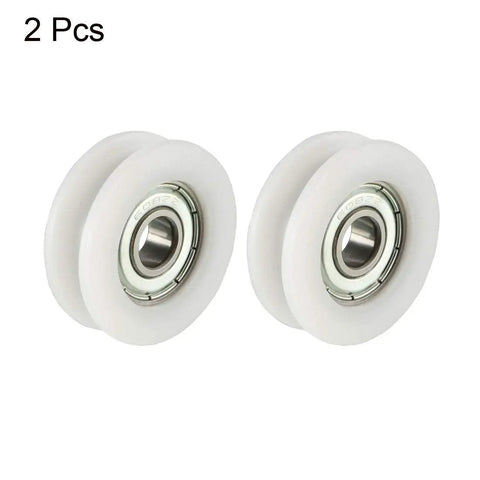 Kickass Smooth Glide 2 Pack Nylon Flat Belt Pulley Wheel With Precision Sealed Ball Bearing For Silent Linear Motion and Hardcore Build Quality For Any Workshop Job. Flat white nylon pulleys with sealed ball bearings.