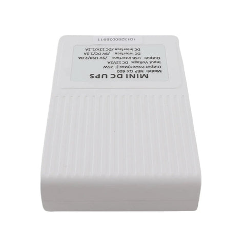 Bad Boy Mini UPS Battery Backup With 8000mAh, compact white device with ribbed design for routers and cameras.
