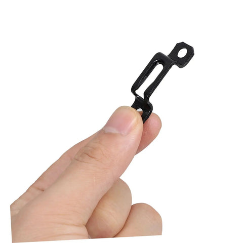 Dead Simple 30 Piece Heavy Duty Metal Furniture Joint Snap Connectors For Sofa Cabinet Assembly No Sweat Tool Free Setup For Smooth Diy Wood Fix Projects, single black metal connector held in hand.