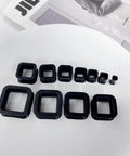 Rectangle Silicone Ear Tunnels And Plugs 00G 10MM Hollow Square Flexible Gauges Set in black, arranged on white surface