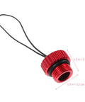 Close-up of red metal cap from 5 Pack Scuba Tank Valve Dust Cap Protectors And Lightweight Valve Cover Caps For Diving