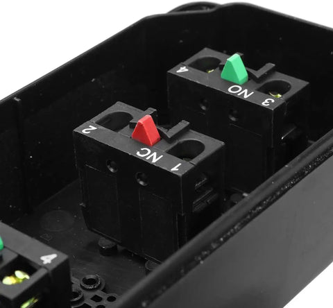 Internal view of 3 Button Industrial Control Station with up and down arrows, center stop, built tough white and black housing.