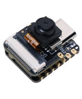 Compact ESP32 S3 Development Board with detachable OV2640 camera sensor and digital microphone, featuring WiFi and BLE 5.0 support.