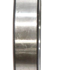 Side view of Rear Outer Wheel Bearing For 2019-2023 Ford Transit Van and 2019 Ford E-Series Replacement Part LM104911, metallic finish.