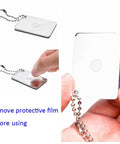 Reflective signal mirror with chain from 2X Survival Whistles With Lanyards And 2X Reflective Signal Mirrors kit, protective film being removed