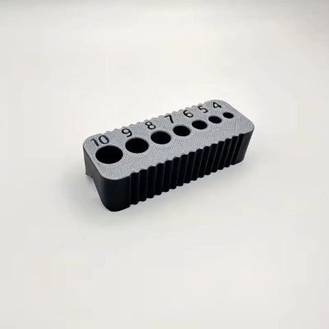 Premium Drill Guide Block For Woodworking And Cabinet Projects Legit Straight Hole Locator Carpenter Jig with metric sizes in black polymer.