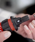 Rechargeable 4V Cordless Screwdriver With Circuit Sensor Technology close-up with bit holder and bit being inserted