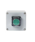 Front view of metal push-button control box with green circular button in clear protective cover.