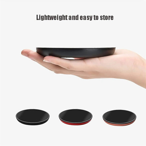 Top Shelf Electric Mug Warmer With Automatic Shut Off Keeps Your Coffee Tea And Water Nice And Toasty On Desk Or Nightstand Snug Little Heater held in hand, showing compact design.