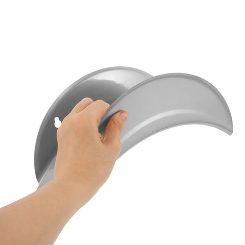 Hand holding a Heavy Duty Wall Mount Hose Hanger 2 Pack Sturdy Iron Metal Rack for Garden Storage and space-saving.