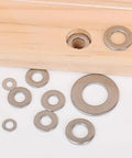 Close-up of 180 Piece Stainless Steel Flat Washer Set M2 To M10 For Fastening DIY Repairs Gasket Spacers Round Metal Washers Kit