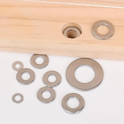Close-up of 180 Piece Stainless Steel Flat Washer Set M2 To M10 For Fastening DIY Repairs Gasket Spacers Round Metal Washers Kit