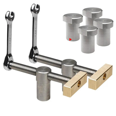 Components of Heavy Duty Woodworking Workbench With Integrated Screw And Accessory Fixing System For DIY Pros including wrenches and screws.