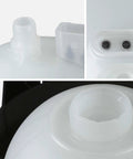 Close-up of Aftermarket Coolant Reservoir Tank With Cap And Sensor features, showing connection ports and sturdy resin design.
