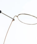 Universal Glasses Repair Kit With Screws And Two Pairs Of Replacement Arms For Broken Specs featuring eyeglasses being repaired.