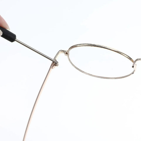 Universal Glasses Repair Kit With Screws And Two Pairs Of Replacement Arms For Broken Specs featuring eyeglasses being repaired.